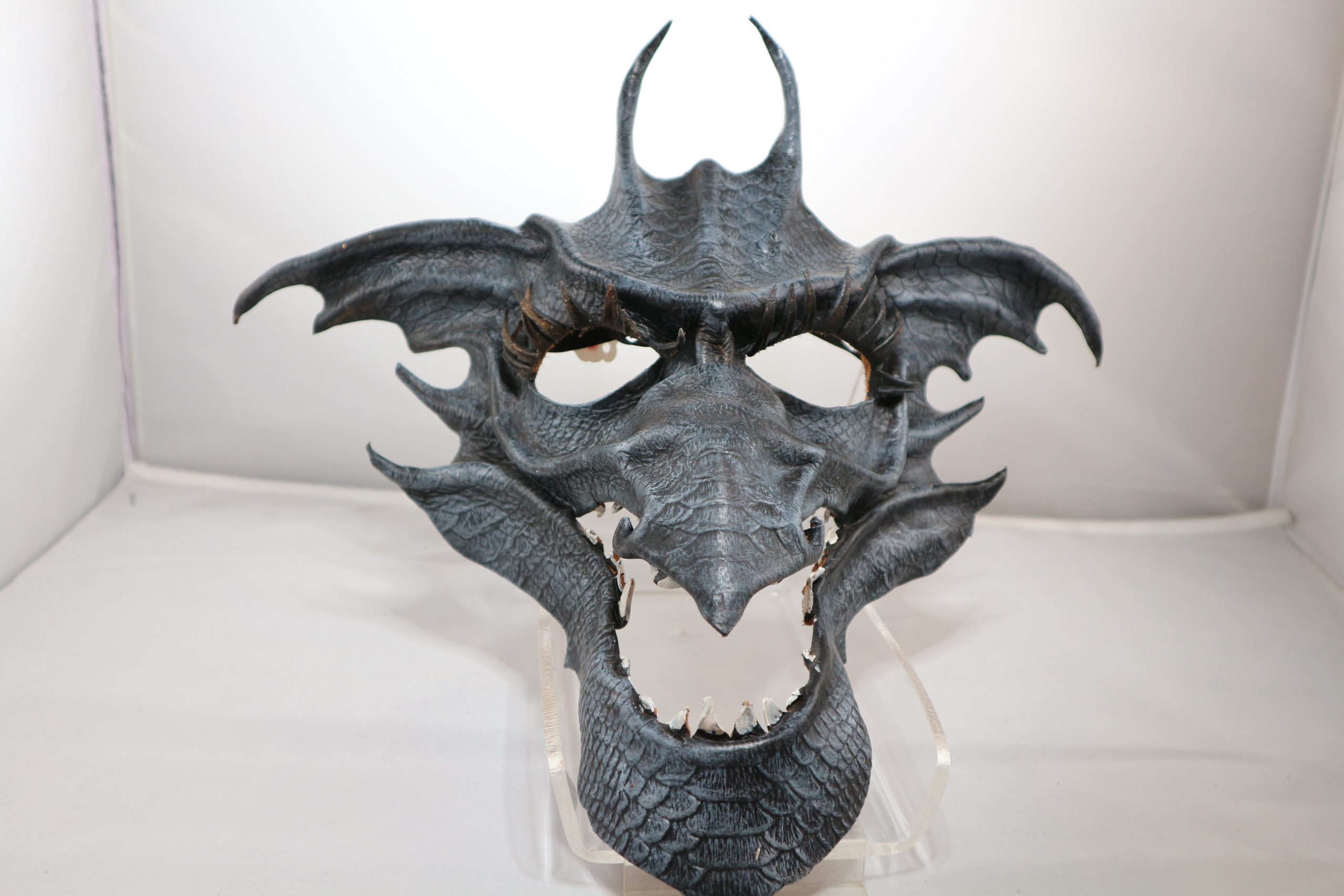 Papier mache mask of a dragon